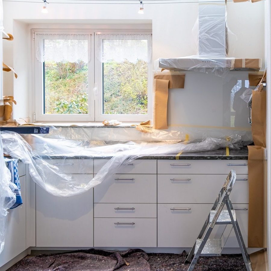 white wooden cabinet near window